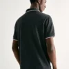 036H6UEN-02 REMERA POLO PIQUET GRIS OSCURO HERING