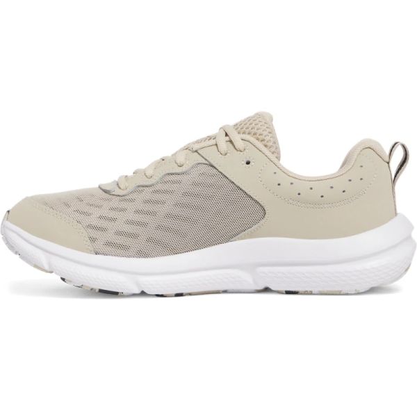 UNDER ARMOUR UA CHARGED ASSERT 10 HOMBRE BEIGE Y BLANCO - Imagen 2