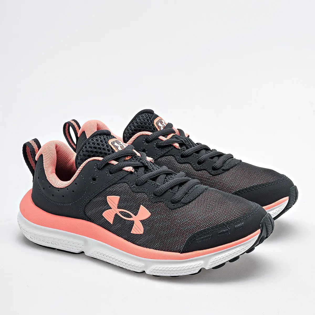 UNDER ARMOUR ASSERT 10 AC JUVENIL NEGRO Y CORAL - Imagen 2
